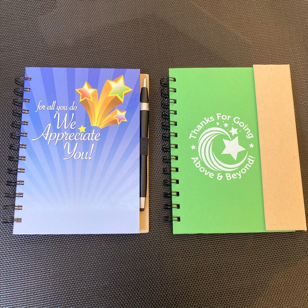 Set of Two Spiral “Thank You” Notebooks with Pens. 1 has multiple sticky notes